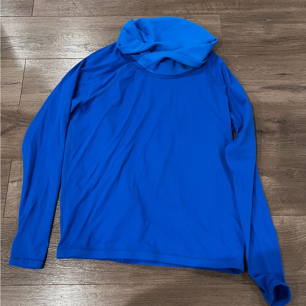 Lululemon Women’s long sleeve sweater. Blue. Size fits like a 6